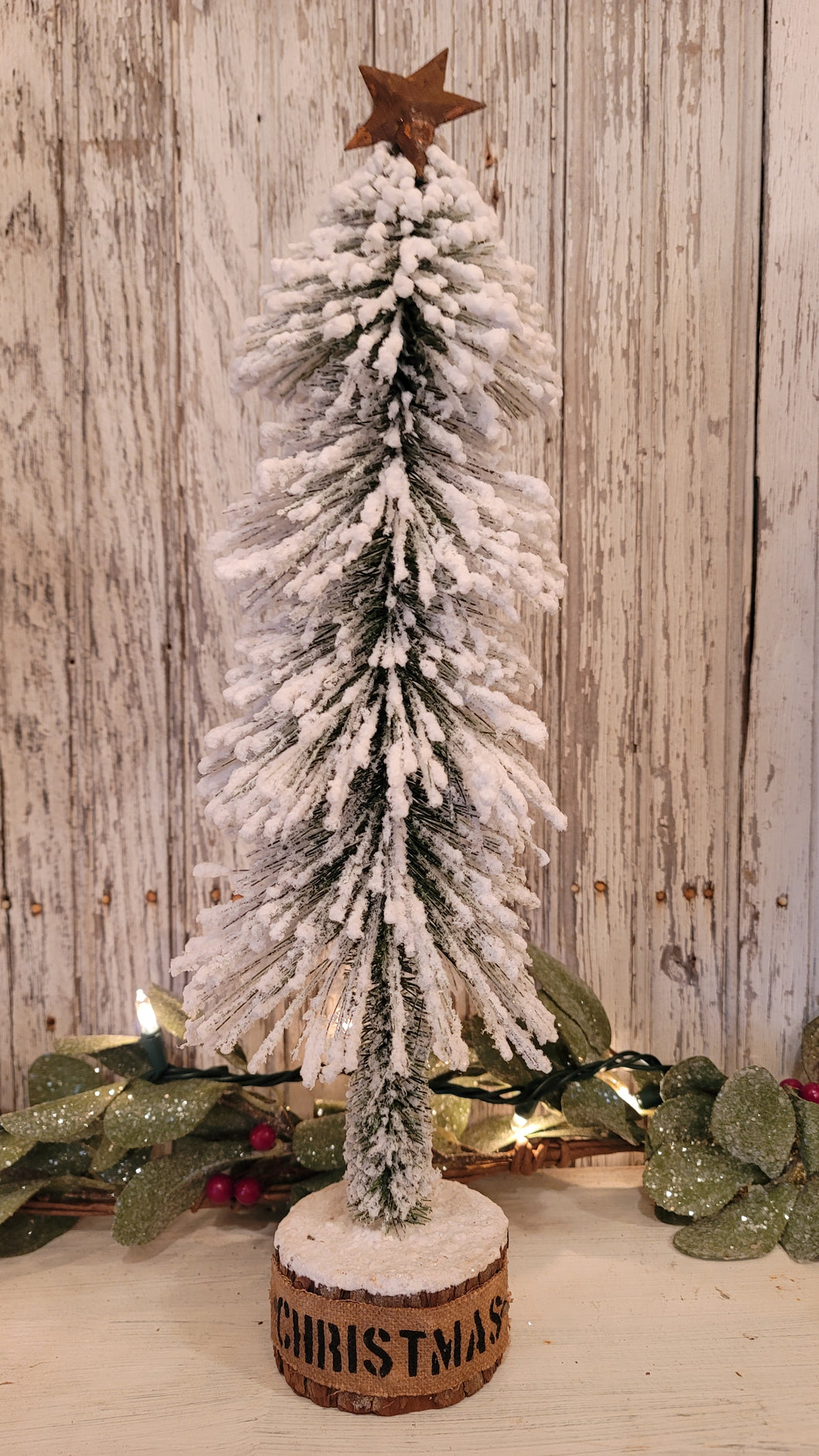 Hand stenciled Christmas tree with rusty star